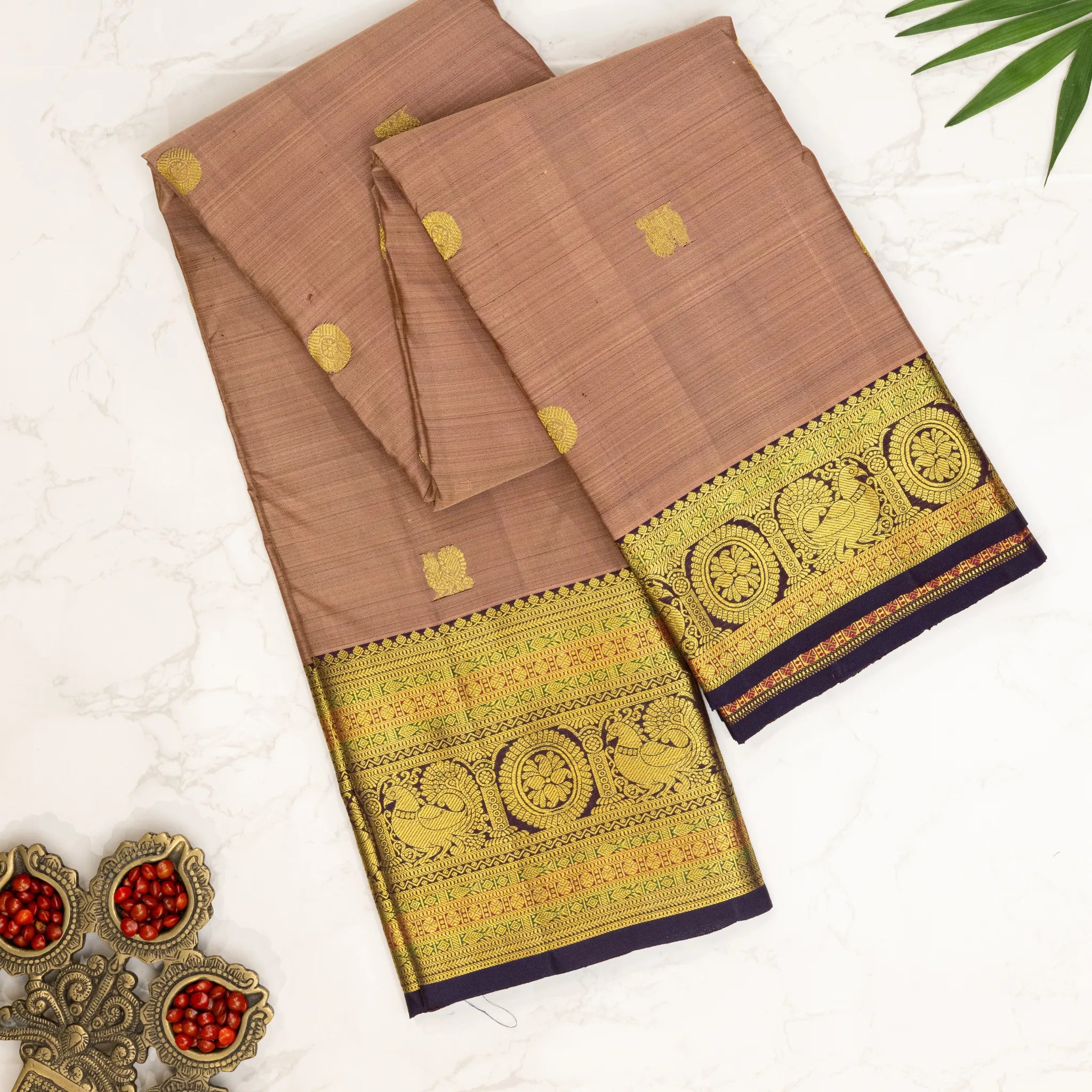 Dusty Beige Kanchipuram Silk Saree – Gold Zari Buttas with Traditional Peacock Border