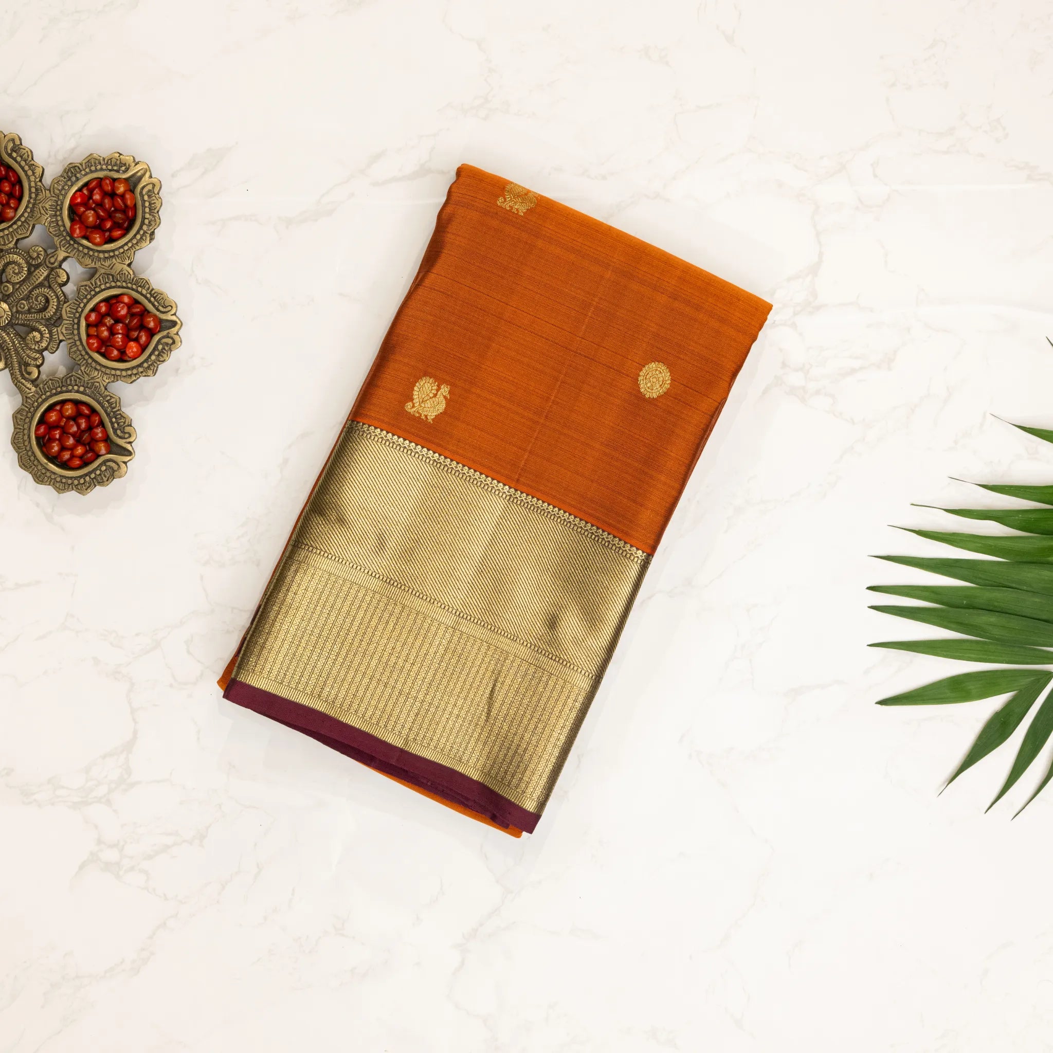 Burnt Orange Kanchipuram Silk Saree – Gold Buttas with Traditional Zari Border