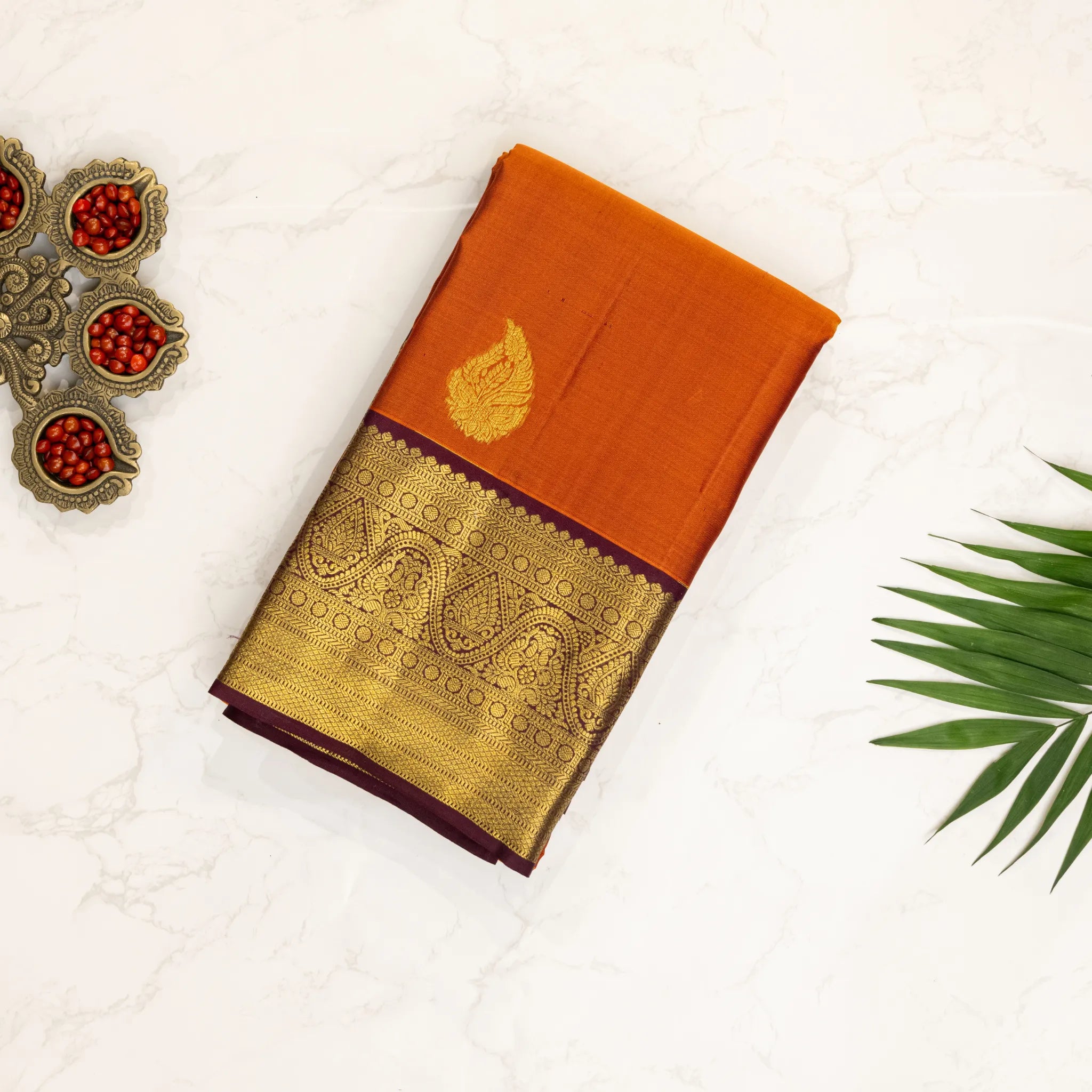 Rust Orange Kanchipuram Silk Saree – Gold Paisley Buttas with Rich Antique Zari Border