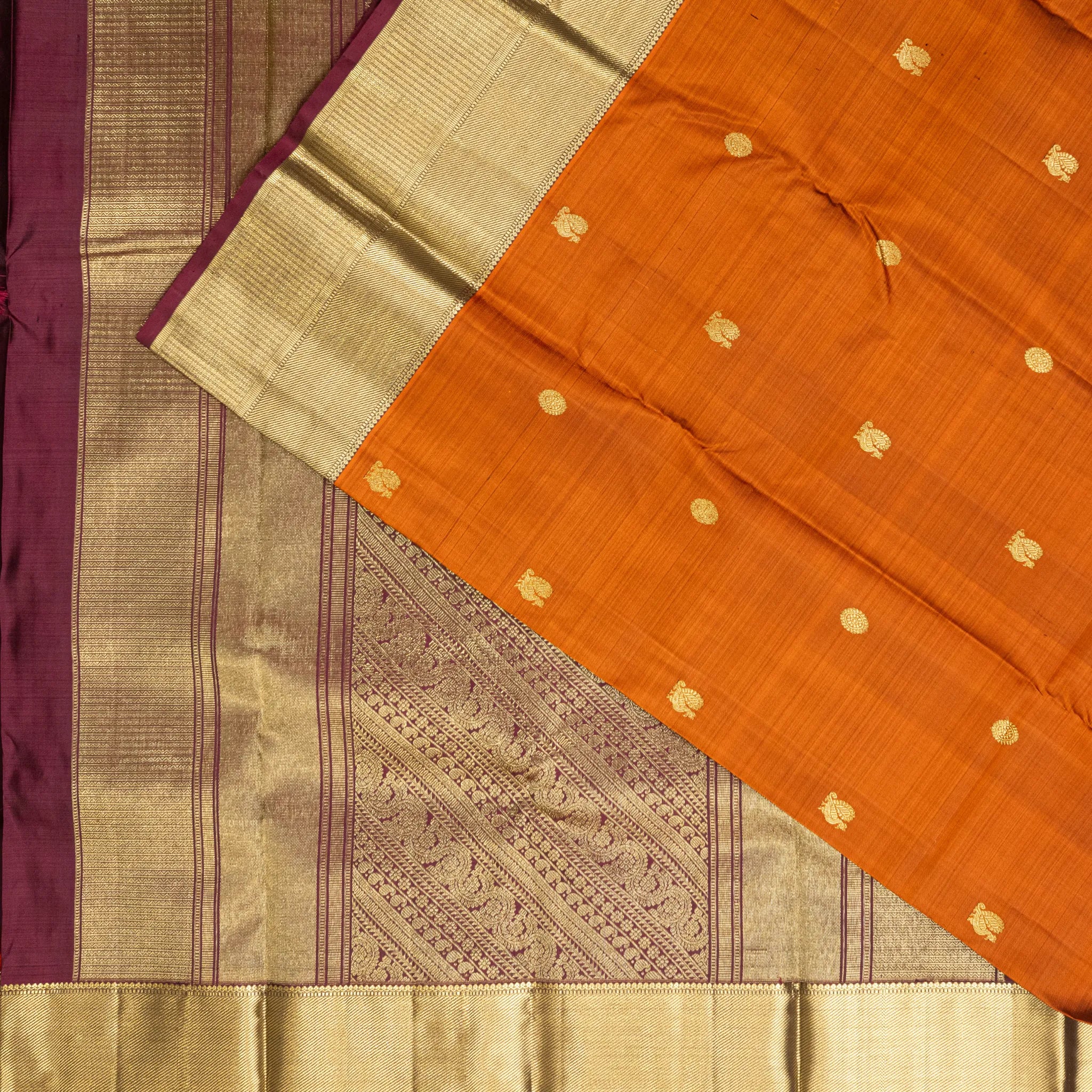 Burnt Orange Kanchipuram Silk Saree – Gold Buttas with Traditional Zari Border