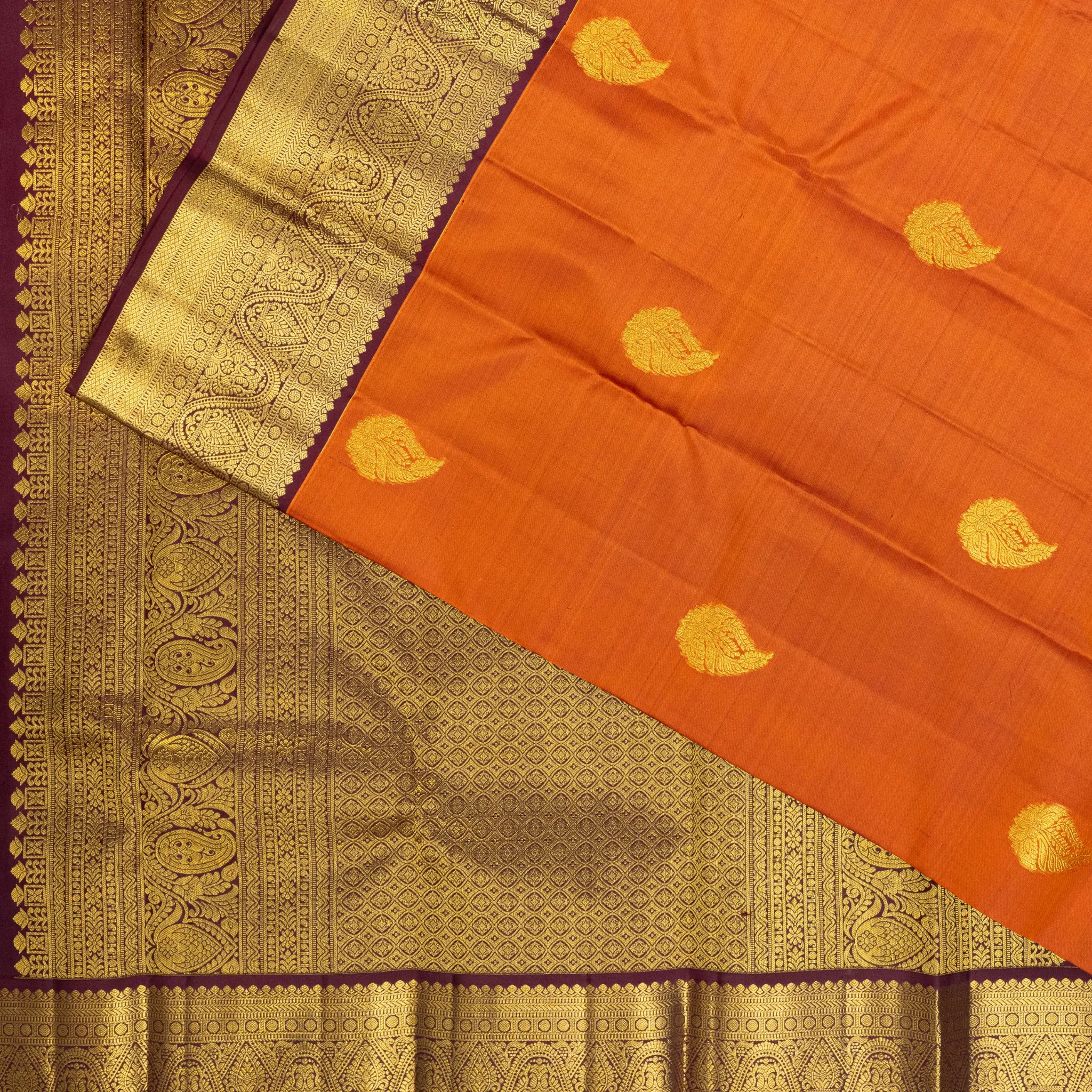 Rust Orange Kanchipuram Silk Saree – Gold Paisley Buttas with Rich Antique Zari Border